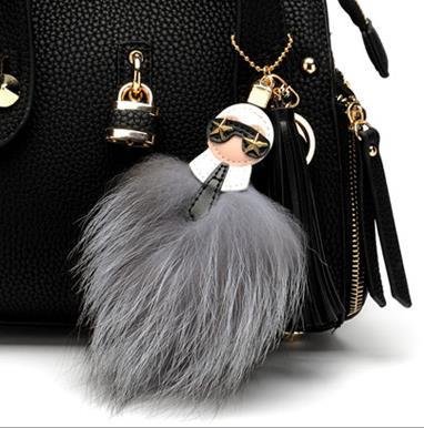 Luxury brand Karl face tassel fur pompom stainless steel keychain key chain ring charm women bag puppe golf cart bag pendant - TheRepublicStudio
